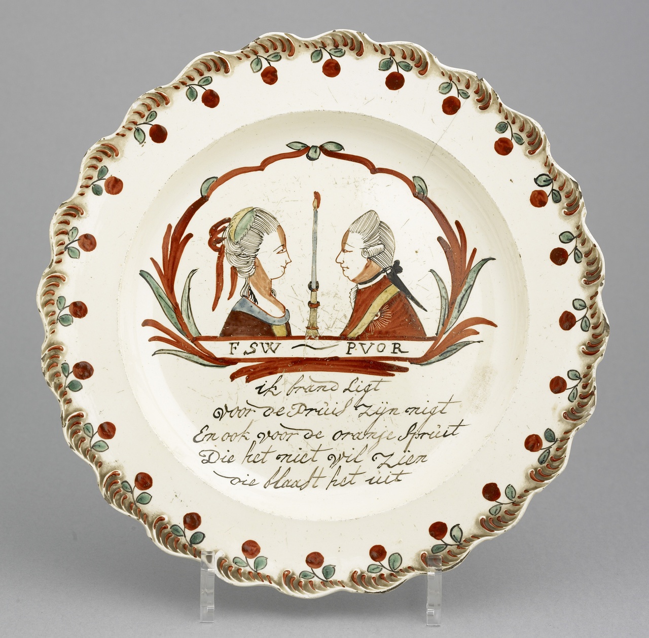 Creamware bord met de portretten van prinses Wilhelmina en prins Willem V